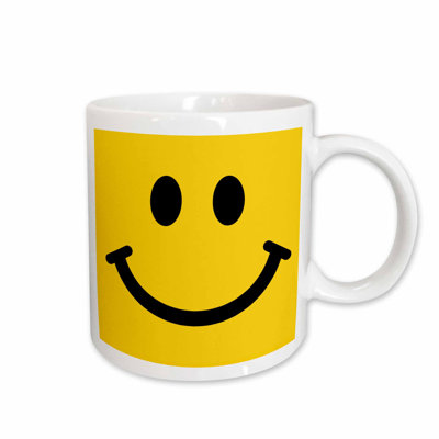Smiley face in coffee cup Smiley face in coffee cup